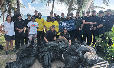 Beach Cleanup with British Navy Crew Members from the HMS Dauntless
